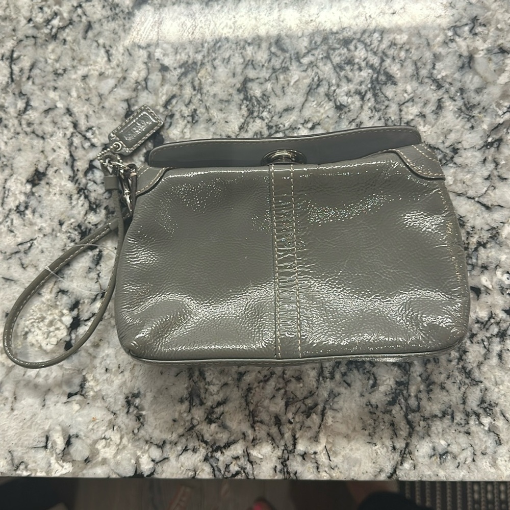 Coach mini clutch with wrist strap